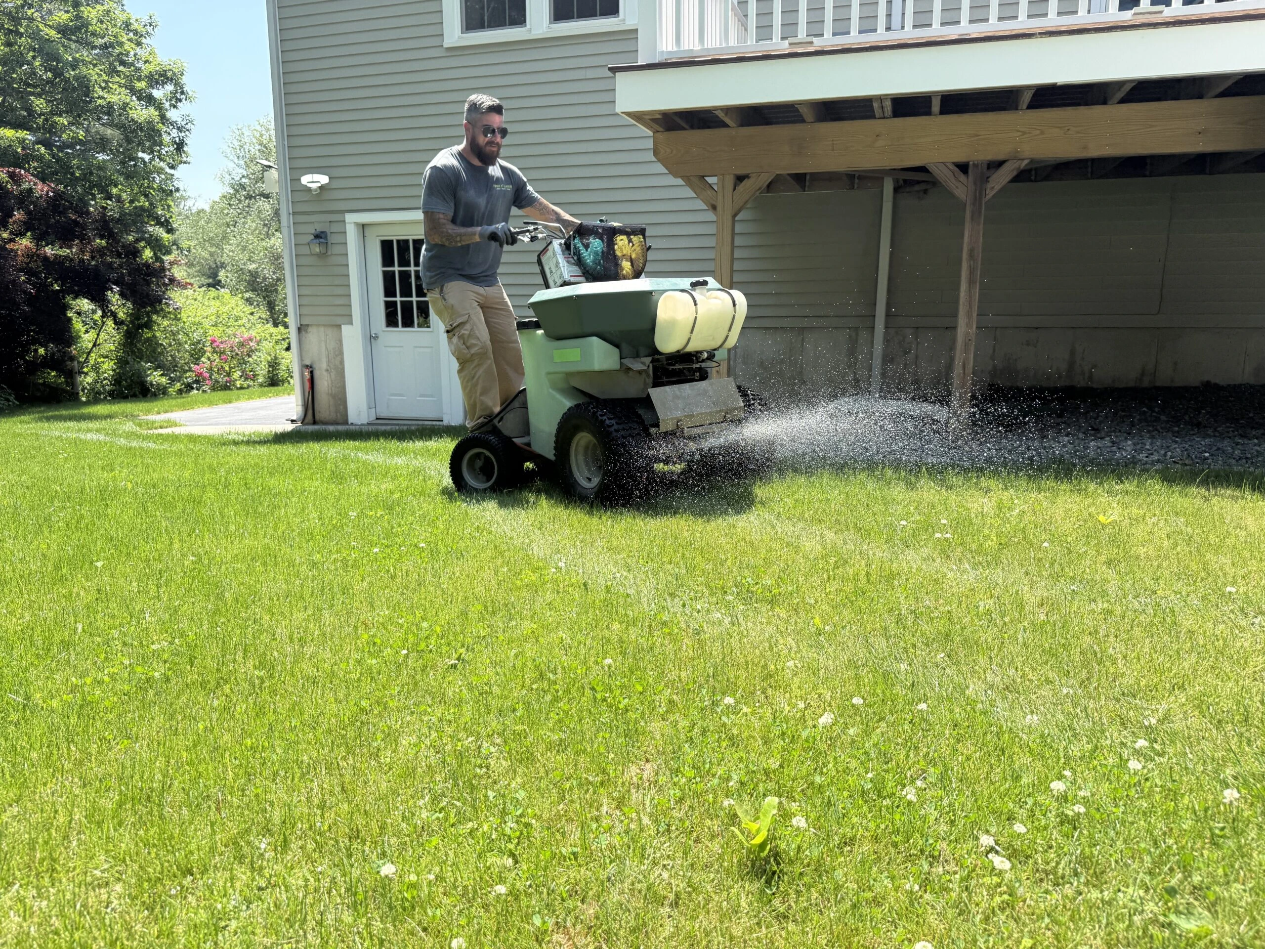 Liquid lawn fertilizer application in Massachusetts