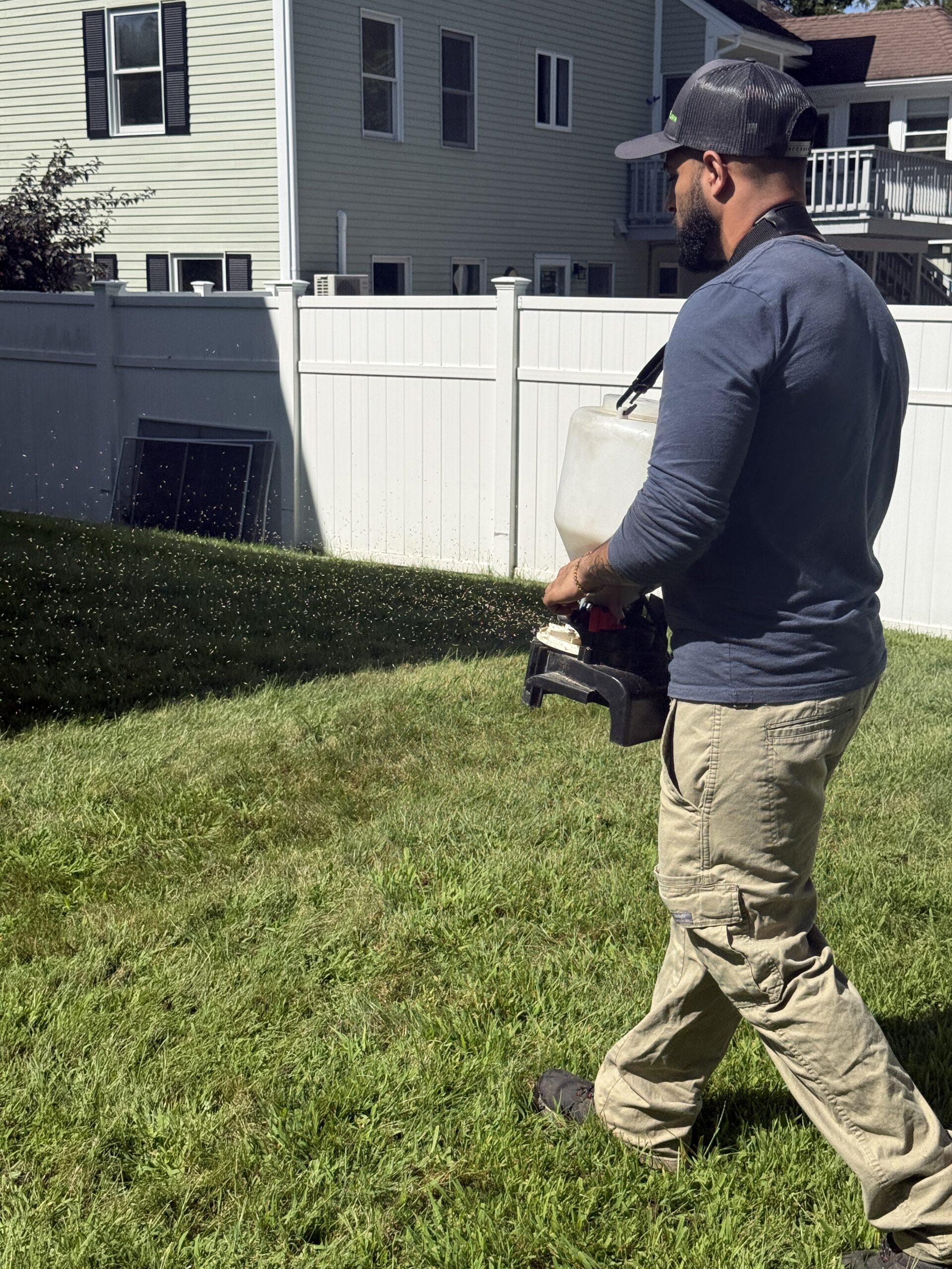 Residential lawn overseeding service in Massachusetts by Truly Lawn